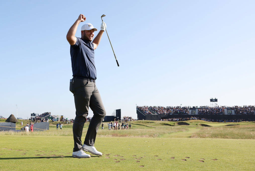 Jonathan Thomson celebrates his hole-in-one on the 16th